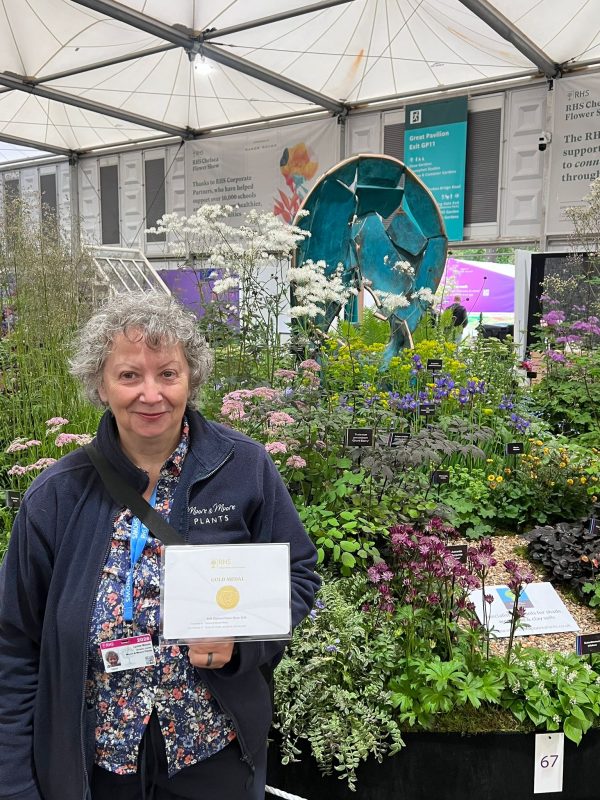 Lynne Moore of Moore & Moore Plants holding her Gold medal at RHS Chelsea Flower Show 2026